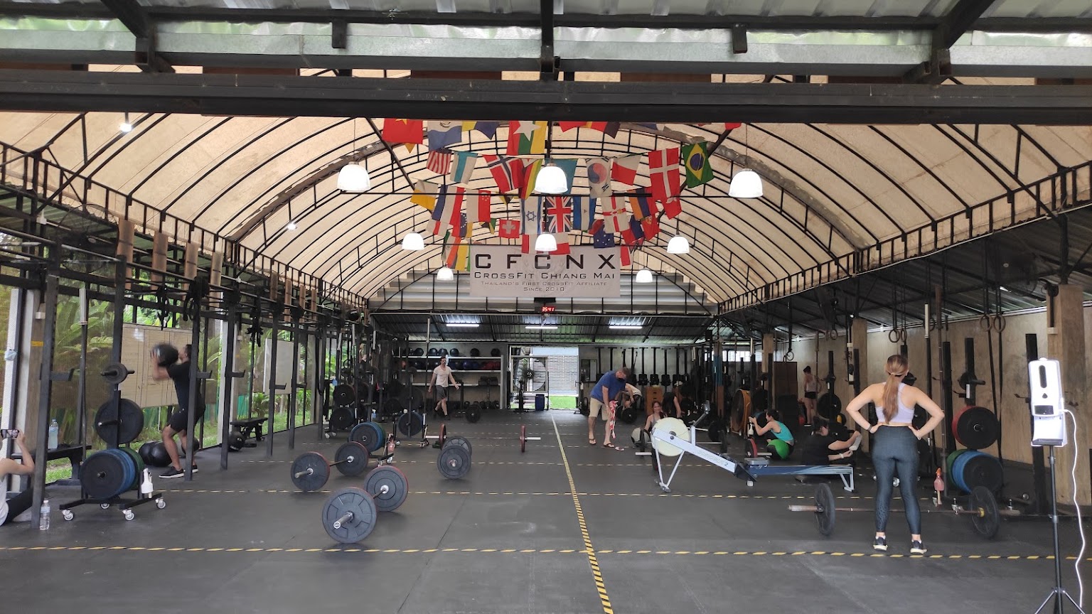 Chiang Mai training and recovery space with equipment and people exercising