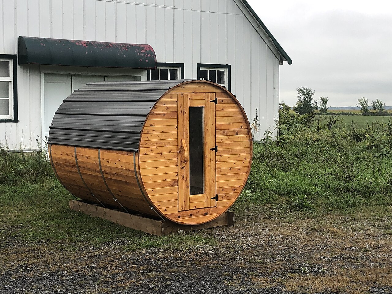 Outdoor barrel sauna used as an example of a home sauna setup